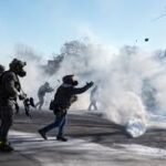 God Help Americans, while America offers “help” to Iranian protesters